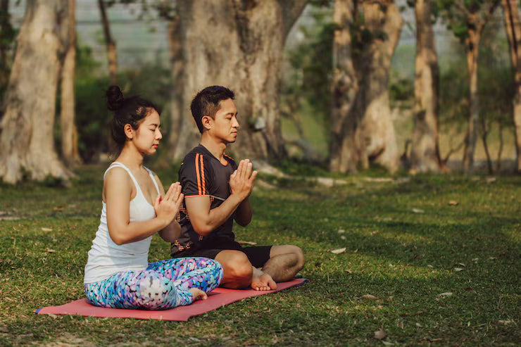 Himhera Modern Wellness Young couple doing yoga